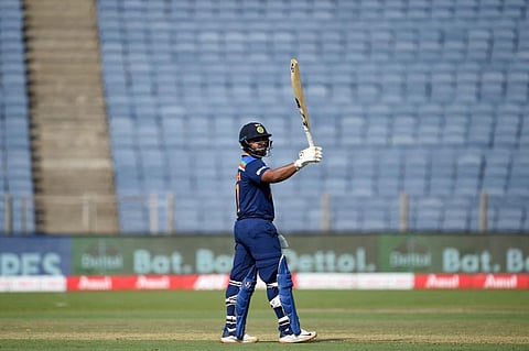 Indian player Rishabh Pant raises his bat in celebration after scoring fifty. (Photo | AFP)