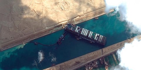 This satellite image from Maxar Technologies shows the cargo ship MV Ever Given stuck in the Suez Canal. (Photo | AP)