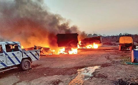 Flames devour vehicles parked near the irrigation camp that caught fire near Pippalakoti in Adilabad. (Photo| EPS)