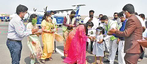 Airport officials according a special welcome to six-year-old passenger Prateeksha at Uyyalawada Narasimha Reddy Airport in Kurnool on Sunday | Express