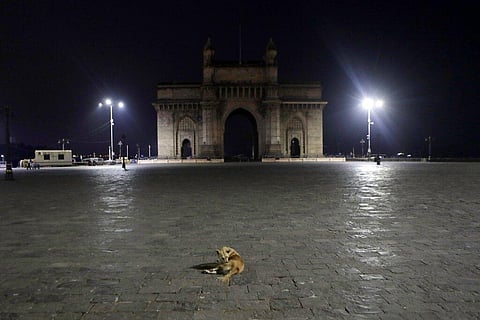 The Gateway of India wears a deserted look following the night curfew imposed by the authorities due to the rise in COVID-19 cases in Mumbai. (Photo | AP)
