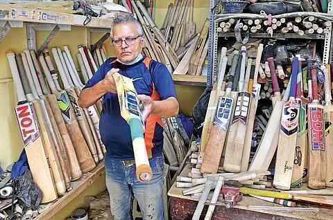 Ram Bhandari is currently repairing bats for state cricket players. (Photo | Ashishkrishna HP, EPS)