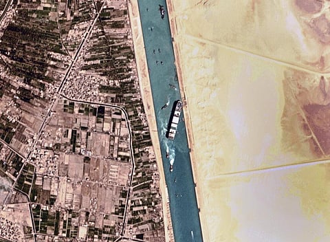 This satellite photo from Planet Labs Inc. shows the Ever Given cargo ship stuck in Egypt's Suez Canal Monday, March 29, 2021. (Photo | AP)