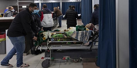 A Palestinian patient infected with COVID-19 is admitted for medical observation at the emergency unit, in the Palestine Medical Complex, in the West Bank city of Ramallah. (Photo | AP)