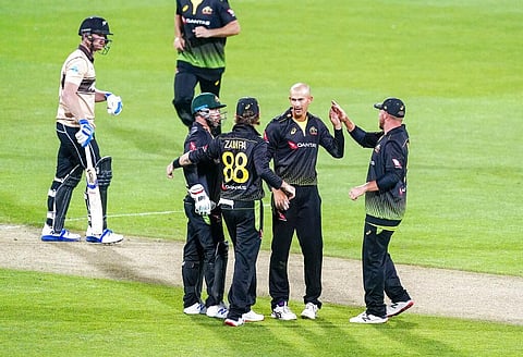 Australia's Ashton Agar, second right, is congratulated by teammates after taking a New Zealand wicket. (Photo| AP)
