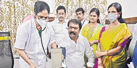 Labour Minister Gummanur Jayaram gets his BP checked after inaugurating the model ESI dispensary in Vijayawada. (Photo| Prasant Madugula, EPS)