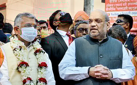 Union Home Minister Amit Shah and West Bengal BJP president Dilip Ghosh (Photo | PTI)