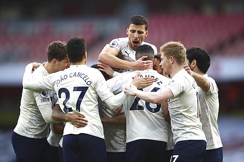 Manchester City players celebrate after a goal. (Photo | AP)