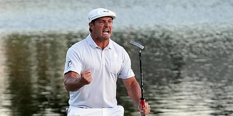 Bryson DeChambeau celebrates after sinking a putt to win the Arnold Palmer Invitational golf tournament. (Photo| AP)