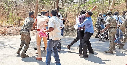 KU students being detained by police after they prevented TRS MLC candidate Palla Rajeshwar Rao from entering the campus. (Photo | Express)