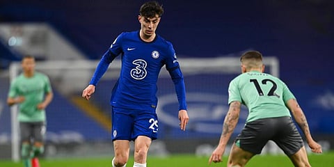 Chelsea's Kai Havertz is challenged by Everton's Lucas Digne during their English Premier League match. (Photo | AP)