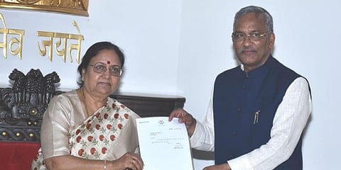 Uttarakhand governor Baby Rani Maurya (L) accepts resignation of CM Trivendra Singh Rawat. (Photo| EPS)
