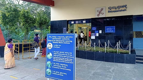 Board outside the Baiyappanahalli Metro Station displays Covid protocol. (Photo | Express)