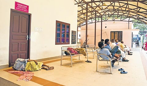 A man sleeping at the doorstep of the feeding room built to make women and nursing mothers safer at Kaloor bus stand