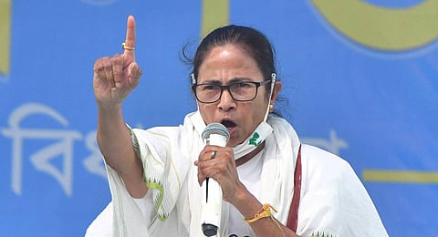 West Bengal Chief Minister Mamata Banerjee addresses a public meeting, at Singur in Hooghly district. (Photo | PTI)