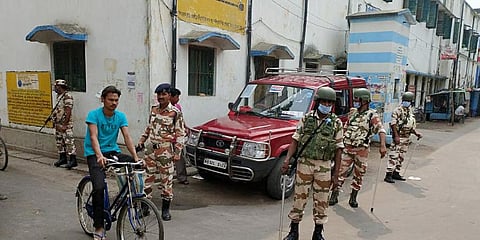 ITBP personnel stands guard during fourth phase of the West Bengal Assembly elections, in Hoogly. (Photo | ANI)
