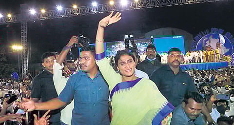 Y S Sharmila waves at the crowd during her Sankalpa Sabha in Khammam on Friday