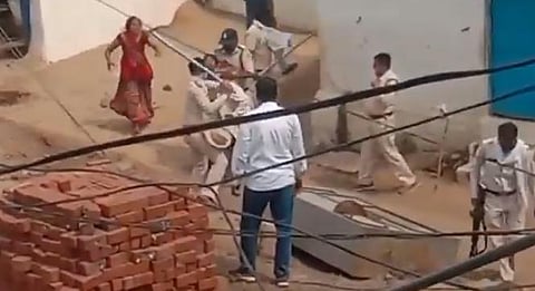 The video which went viral on Sunday evening showed the cops assaulting the COVID patient and family members.