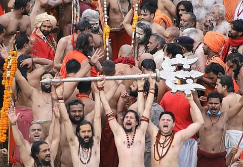 Priests and saints during the Shahi Snan in Haridwar on Monday. (Photo | EPS)