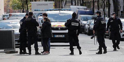Police officers work after a shooting Monday, April 12, 2021 in Paris. (Photo | AP)