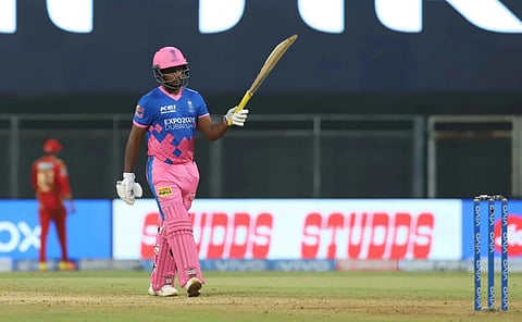 Sanju Samson captain of Rajasthan Royals raises his bat after scoring a hundred during match against Punjab Kings on Monday. (Photo | IPLT20/BCCI)