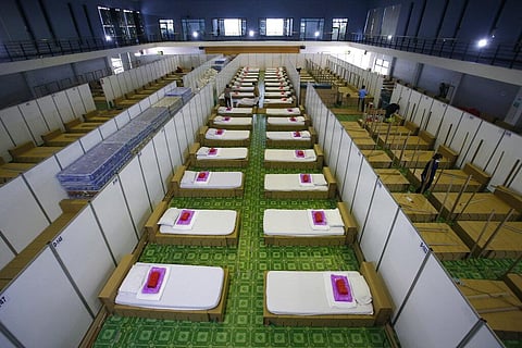 Thai workers prepare a field hospital for COVID-19 patients in Bangkok, Thailand. (Photo | AP)