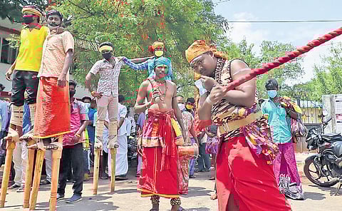 The folk artists performing in Madurai on Monday. (Photo| KK Sundar/EPS)