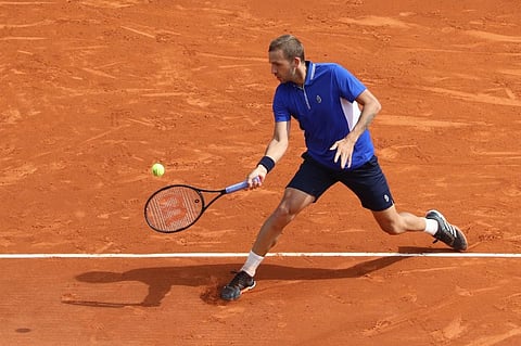 Britain's Daniel Evans plays a return during his third round singles match against Serbia's Novak Djokovic on day six of the Monte-Carlo Masters Series tournament in Monaco on April 15. (Photo | AFP)