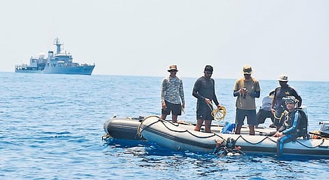 Indian Navy personnel conduct search and rescue operations for the missing fishermen, in the Arabian Sea off the Mangaluru coast on Wednesday | Express