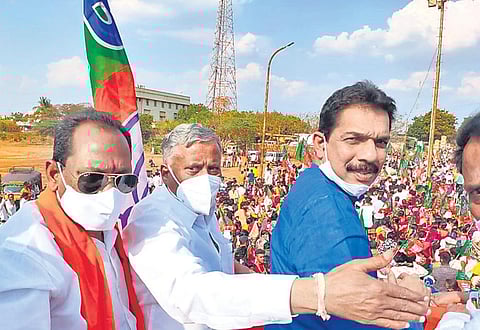 State BJP unit president Nalin Kumar Kateel, Home Minister Basavaraj Bommai, Housing Minister V Somanna participate in a road show at Basavakalyan on Thursday, the last day of open campaign | Express