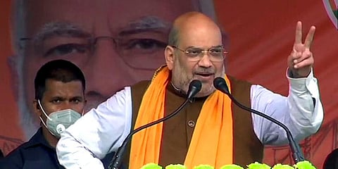 Home Minister Amit Shah addresses the crowd during an election campaign ahead of the fifth phase of the West Bengal Assembly election. (Photo | ANI)