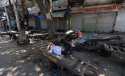 Khari Baoli market wears a deserted look during weekend lockdown imposed in the wake of rising covid-19 cases, in New Delhi. (Photo | Shekhar Yadav, EPS)