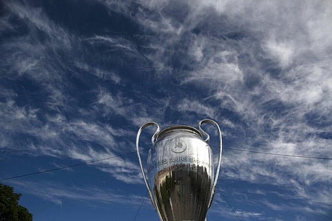 A giant replica of the UEFA Champions League trophy is displayed at the Rossio square downtown Lisbon, Portugal. (Photo | AP)