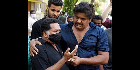 Actors Mayilsamy (left) and Mansoor Ali Khan (right) at Vivekh's residence in Chennai on Saturday. (Photo | R Satish Babu, EPS)