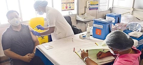 A man takes the Covid-19 vaccine at a facility in the city on the first day of Phase 4 of the vaccination drive, on Thursday | Ashishkrishna HP