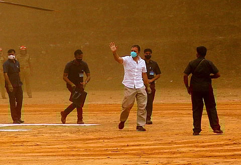 Congress leader and MP Rahul Gandhi greeting party workers during the election campaign of C P Cheriya Muhammed, the UDF candidate in Thiruvambady, at Koodaranji in Kozhikode on Thursday. | T P Sooraj
