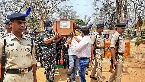 CRPF personnel carry the coffin of a jawan who lost his life in an encounter with Maoists. (Photo | PTI)