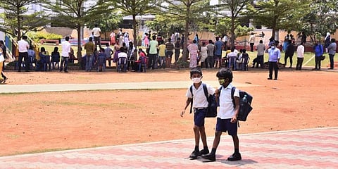 Government school students walk to school in Visakhapatnam (Photo | G Satyanarayana, EPS)