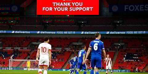 Fans watching the English FA Cup semifinal football match between Leicester City and Southampton at Wembley Stadium in London. (Photo | AP)