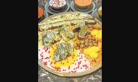 The platter includes Gold Leaf kababs Kashmiri lamb seekh kababs, old Delhi lamb chops, Rajput chicken kababs, Mughlai koftas and malai chicken roast served on a bed of saffron-infused biryani.