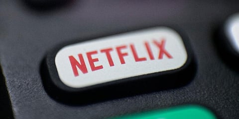 Photo shows a logo for Netflix on a remote control in Portland, Ore. (Photo | AP)