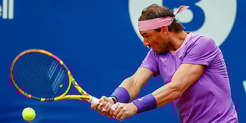 Rafael Nadal of Spain returns the ball to Ilya Ivashka of Belarus during the Godo tennis tournament in Barcelona. (Photo| AP)