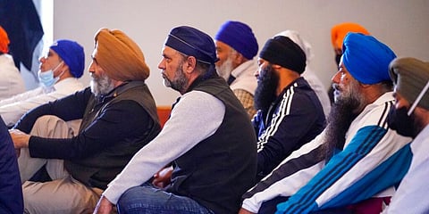 Members of the Sikh Coalition gather at the Sikh Satsang of Indianapolis in Indianapolis