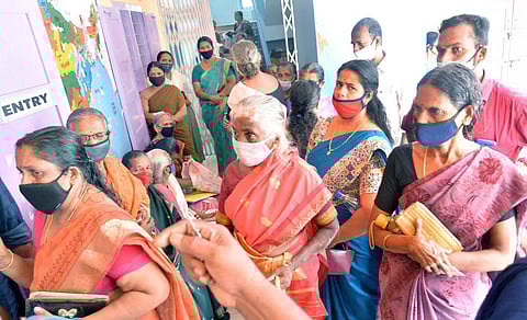 Beneficiaries waiting outside the Covid Vaccination Centre at Govt LP School, Kariyam in Thiruvananthapuram (Photo | Vincent Pulickal, EPS)