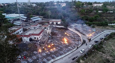 A scene at Bhadbhada cremation ground, amid rise in deaths due to COVID-19, in Bhopal, Wednesday, April 21, 2021. (Photo | PTI)