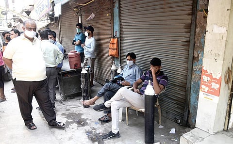 People waiting outside an oxygen filling plant in the city on Thursday. Despite the Centre increasing its quota, Delhi continues to face oxygen shortage | Parveen Negi