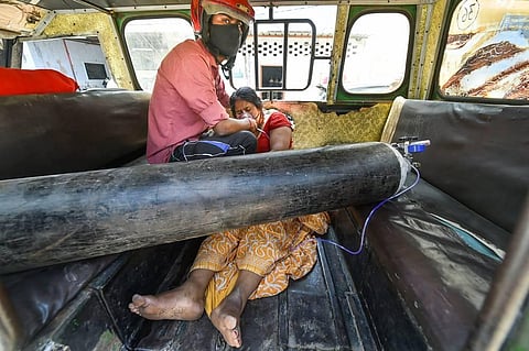 A COVID-19 patient receives primary treatment outside LLR Hospital, amid a shortage in beds and medical oxygen due to surge in coronavirus cases in Kanpur. (Photo | PTI)