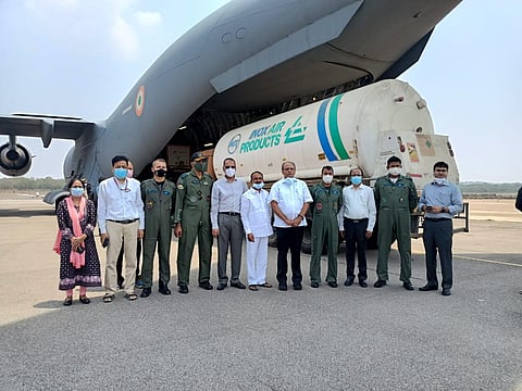 Health Minister Eatala Rajender and Telangana CS Somesh Kumar oversee the sending of empty oxygen tanks from Begumpet Airport to Odisha, to procure oxygen for the state. (Photo | @KTRTRS)