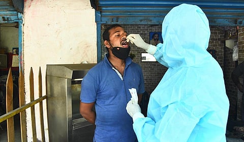 A health worker collecting swab samples in Chennai | Ashwin Prasath