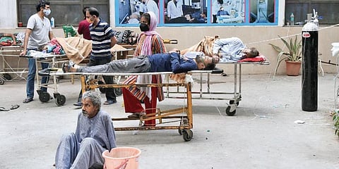 COVID-19 patients await admission at the GTB hospital in Delhi on Friday. (Photo | Parveen Negi, EPS)